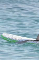 MICHELLE RODRIGUEZ in Bikini Paddleboarding in Sardinia 08/04/2015 (lq tag)