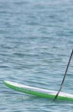 MICHELLE RODRIGUEZ in Bikini Paddleboarding in Sardinia 08/04/2015 (lq tag)