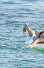 MICHELLE RODRIGUEZ in Bikini Paddleboarding in Sardinia 08/04/2015 (lq tag)