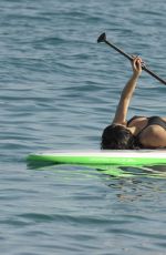 MICHELLE RODRIGUEZ in Bikini Paddleboarding in Sardinia 08/04/2015 (lq tag)