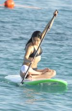 MICHELLE RODRIGUEZ in Bikini Paddleboarding in Sardinia 08/04/2015 (lq tag)
