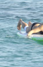 MICHELLE RODRIGUEZ in Bikini Paddleboarding in Sardinia 08/04/2015 (lq tag)