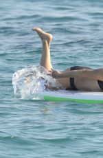 MICHELLE RODRIGUEZ in Bikini Paddleboarding in Sardinia 08/04/2015 (lq tag)