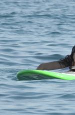 MICHELLE RODRIGUEZ in Bikini Paddleboarding in Sardinia 08/04/2015 (lq tag)