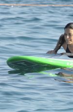 MICHELLE RODRIGUEZ in Bikini Paddleboarding in Sardinia 08/04/2015 (lq tag)