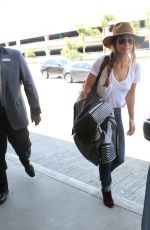 OLIVIA WILDE Arrives at LAX Airport in Los Angeles 08/20/2015