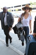 OLIVIA WILDE Arrives at LAX Airport in Los Angeles 08/20/2015