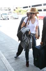OLIVIA WILDE Arrives at LAX Airport in Los Angeles 08/20/2015