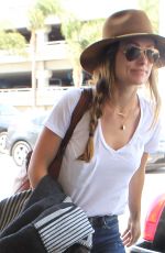 OLIVIA WILDE Arrives at LAX Airport in Los Angeles 08/20/2015