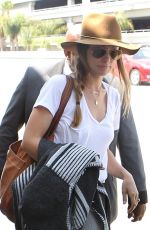 OLIVIA WILDE Arrives at LAX Airport in Los Angeles 08/20/2015