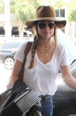 OLIVIA WILDE Arrives at LAX Airport in Los Angeles 08/20/2015