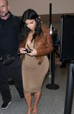 Pregnant KIM KARDASHIAN at LAX Airport in Los Angeles 08/03/2015