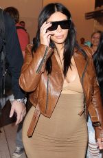 Pregnant KIM KARDASHIAN at LAX Airport in Los Angeles 08/03/2015