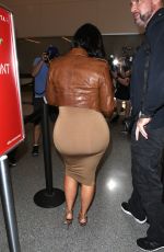 Pregnant KIM KARDASHIAN at LAX Airport in Los Angeles 08/03/2015