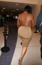 Pregnant KIM KARDASHIAN at LAX Airport in Los Angeles 08/03/2015