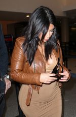 Pregnant KIM KARDASHIAN at LAX Airport in Los Angeles 08/03/2015