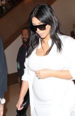 Pregnant KIM KARDASHIAN at Los Angeles International Airport 08/04/2015