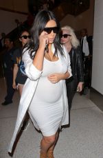 Pregnant KIM KARDASHIAN at Los Angeles International Airport 08/04/2015