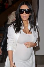 Pregnant KIM KARDASHIAN at Los Angeles International Airport 08/04/2015
