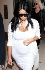 Pregnant KIM KARDASHIAN at Los Angeles International Airport 08/04/2015