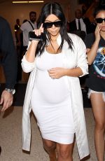 Pregnant KIM KARDASHIAN at Los Angeles International Airport 08/04/2015