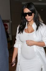 Pregnant KIM KARDASHIAN at Los Angeles International Airport 08/04/2015