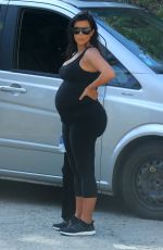 Pregnant KIM KARDASHIAN in Tights Workout at Vacationing in St. Barts 08/18/2015