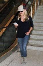 REESE WITHERSPOON in Jeans Arrives at Los Angeles International Airport 08/26/2015