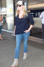 REESE WITHERSPOON in Jeans Arrives at Los Angeles International Airport 08/26/2015