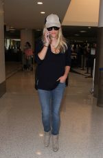 REESE WITHERSPOON in Jeans Arrives at Los Angeles International Airport 08/26/2015