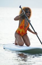 RIHANNA in Swimsuit Paddleboarding in Barbados 08/05/2015