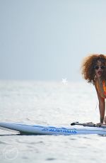 RIHANNA in Swimsuit Paddleboarding in Barbados 08/05/2015