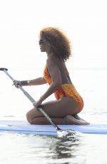 RIHANNA in Swimsuit Paddleboarding in Barbados 08/05/2015