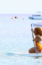 RIHANNA in Swimsuit Paddleboarding in Barbados 08/05/2015