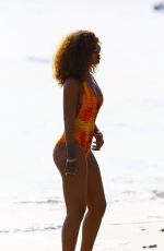 RIHANNA in Swimsuit Paddleboarding in Barbados 08/05/2015