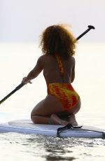 RIHANNA in Swimsuit Paddleboarding in Barbados 08/05/2015