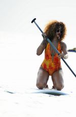 RIHANNA in Swimsuit Paddleboarding in Barbados 08/05/2015
