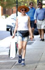 ROSE MCGOWAN in Jeans Shorts Out Shopping in New York 03/08/2015