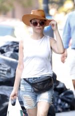 ROSE MCGOWAN in Jeans Shorts Out Shopping in New York 03/08/2015