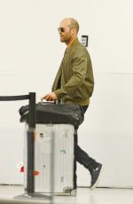 ROSIE HUNTINGTON-WHITELEY Arrives at Airport in Miami 08/06/2015
