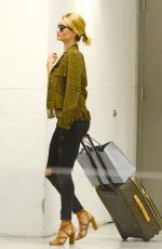 ROSIE HUNTINGTON-WHITELEY Arrives at Airport in Miami 08/06/2015