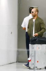 ROSIE HUNTINGTON-WHITELEY Arrives at Airport in Miami 08/06/2015