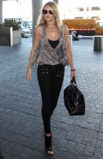 ROSIE HUNTINGTON-WHITELEY Arrives at Los Angeles International Airport 08/29/2015