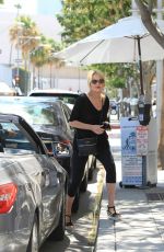 SHARON STONE Picking Up Her Car at Valet Parking