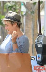 SHARON STONE Picking Up Her Car at Valet Parking