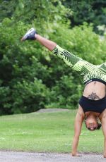 STEPHANIE DAVIS in Tights Workout in a Park in Manchester 07/29/2015