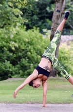 STEPHANIE DAVIS in Tights Workout in a Park in Manchester 07/29/2015