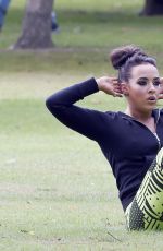 STEPHANIE DAVIS in Tights Workout in a Park in Manchester 07/29/2015
