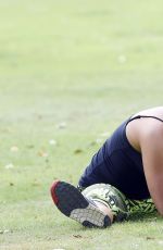 STEPHANIE DAVIS in Tights Workout in a Park in Manchester 07/29/2015