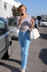 TONI GARRN Arrives at Airport in Mykonos 08/21/2015